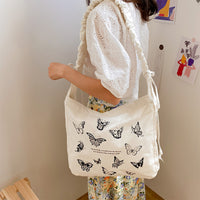 "BLACK/ WHITE BUTTERFLY PRINT PLEATED CANVAS" BAG UB2431