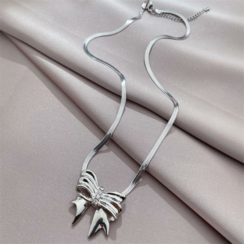 SIMPLE SILVER BOW NECKLACE UB2741